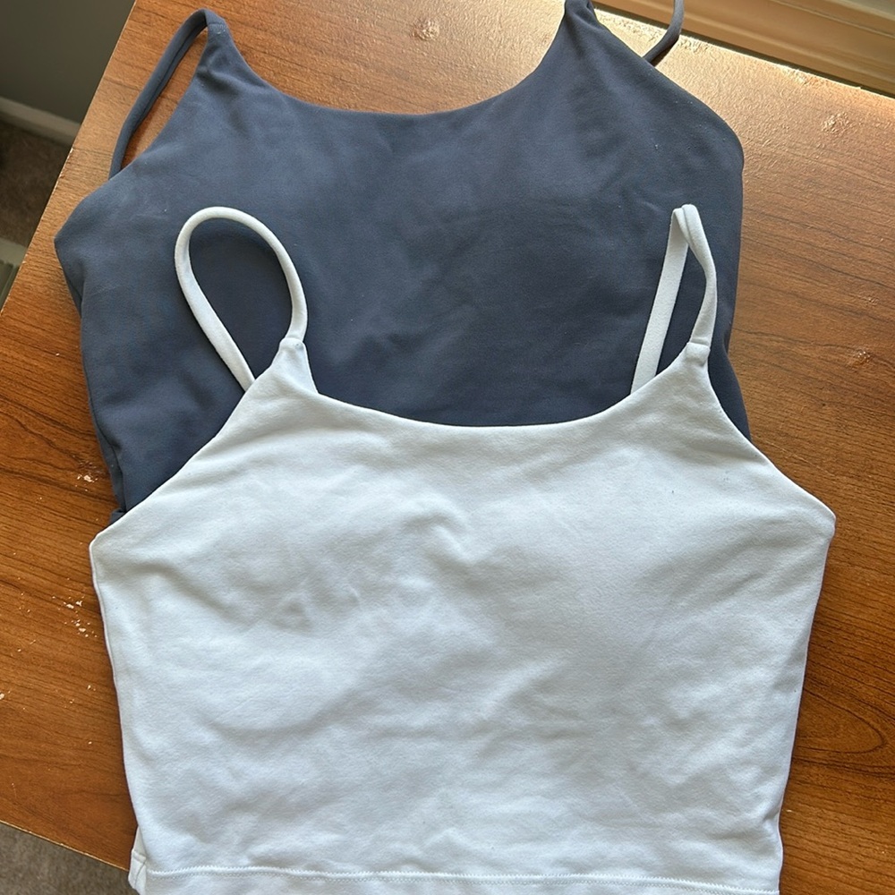 Two tank / layering shirts.   White and navy. Size small